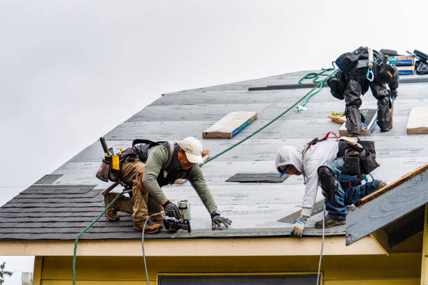 Professional Roofing technician working in Hunter, OK